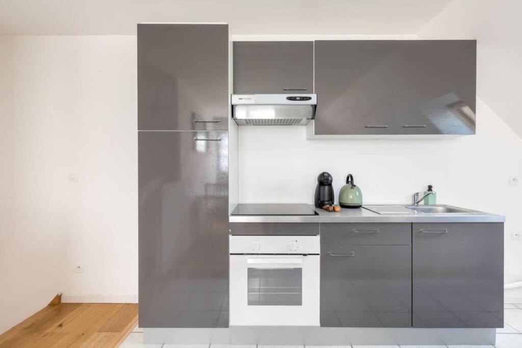 Grand Confort, Appartement Osny Екстериор снимка